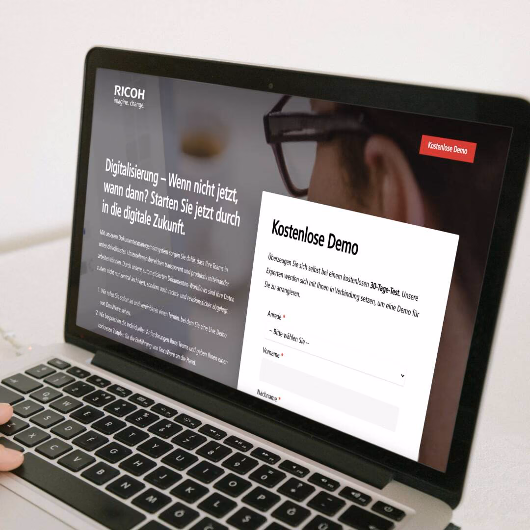 A Ricoh demo form open on a laptop.