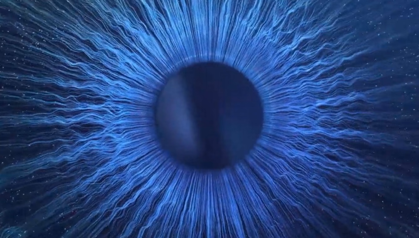 The ZEISS iris motif, blue light radiating from a dark centre.