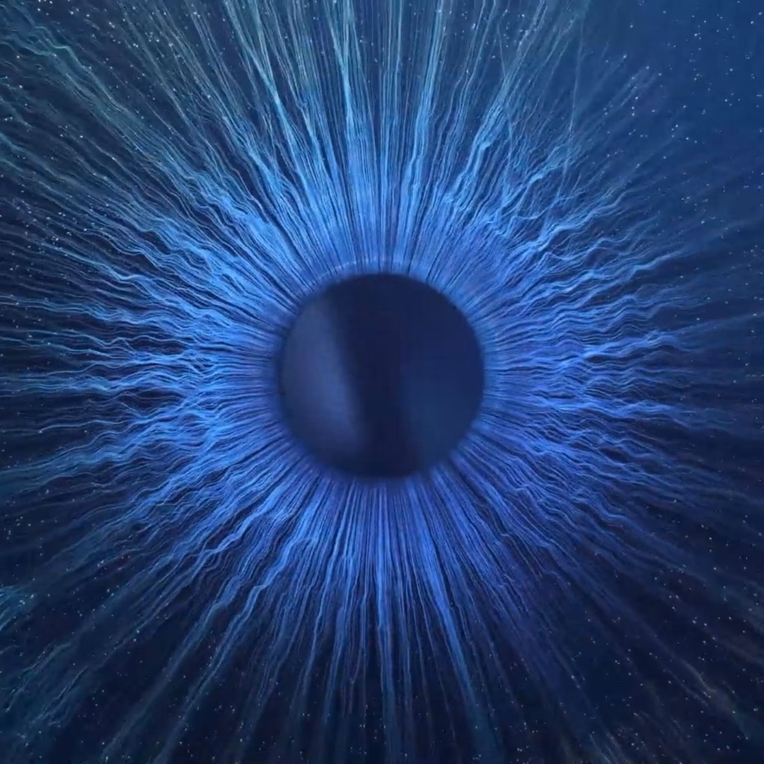 The ZEISS iris motif, blue light radiating from a dark centre.