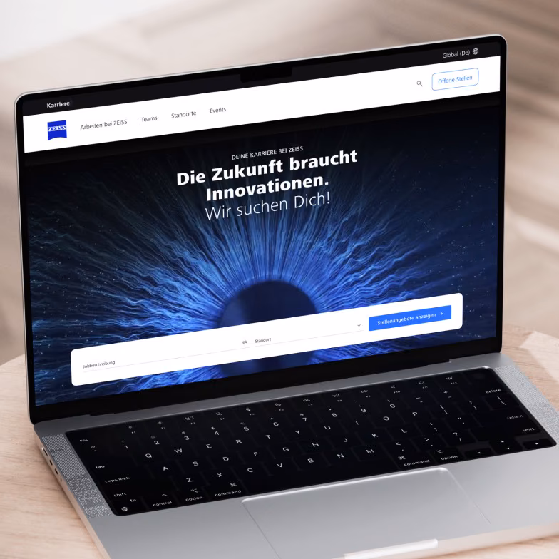 The ZEISS careers homepage open on a laptop.